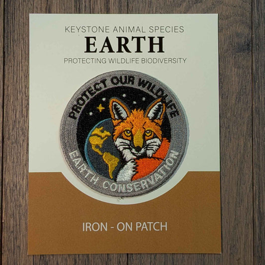 Fox hugging the Earth embroidered iron-on patch. Keystone animal collectors edition patches